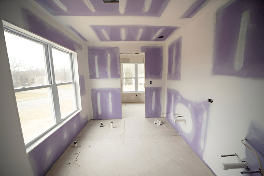 20 Inspiring Small Garage Conversion Ideas 8 Kitchen under construction with drywall installation in progress