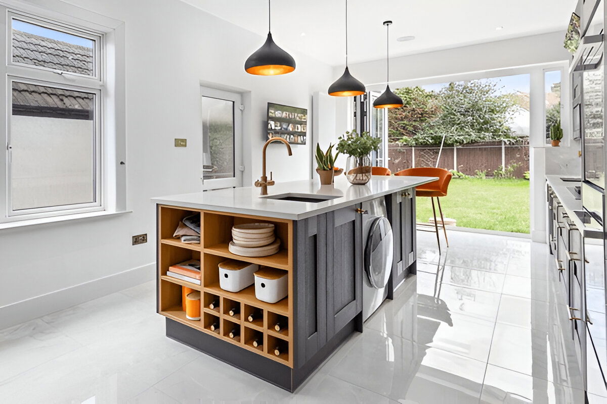 Modern kitchen island with open shelving and pendant lights