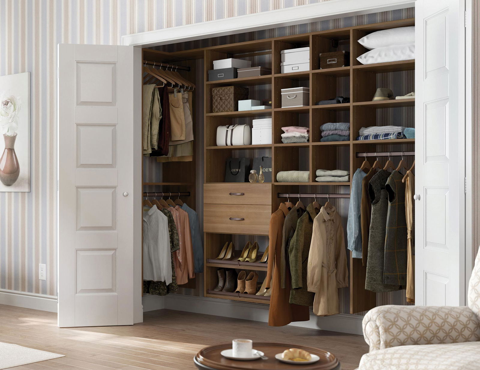 Custom Closet Systems Personalized Guide 7 A well-organized reach-in closet with custom wood shelving, built-in drawers, hanging space, and storage compartments for clothing, shoes, and accessories.