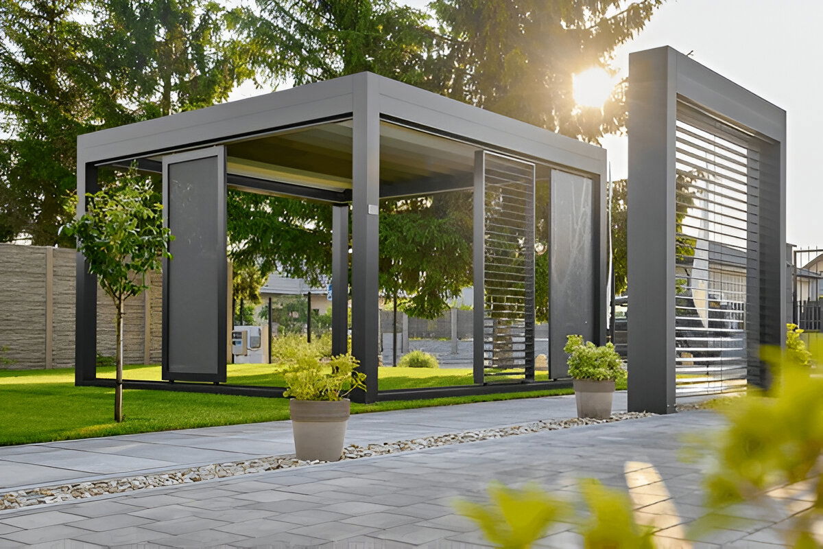 Modern freestanding pergola structure with metal louvers in landscaped backyard