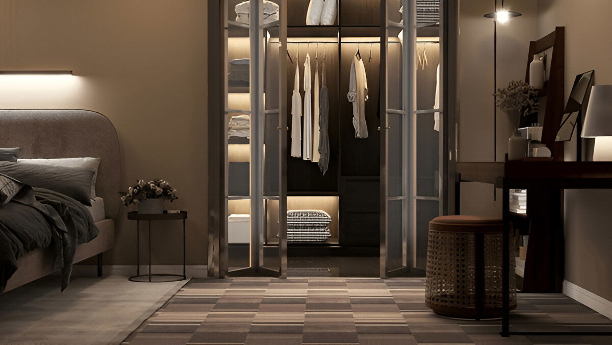 Elegant walk-in closet with ambient lighting in modern bedroom 