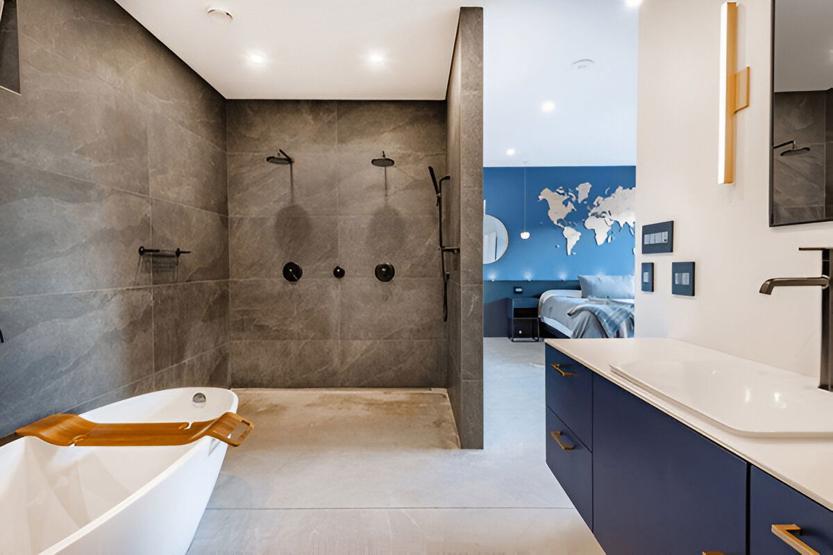 Open bathroom with walk-in shower and modern tub