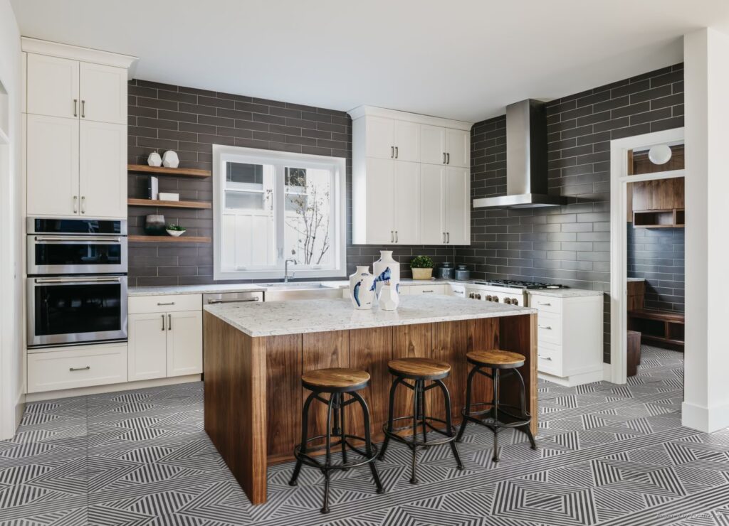 Nolita 24x24 inch matte porcelain floor tile with a soft concrete-like texture in a modern interior setting