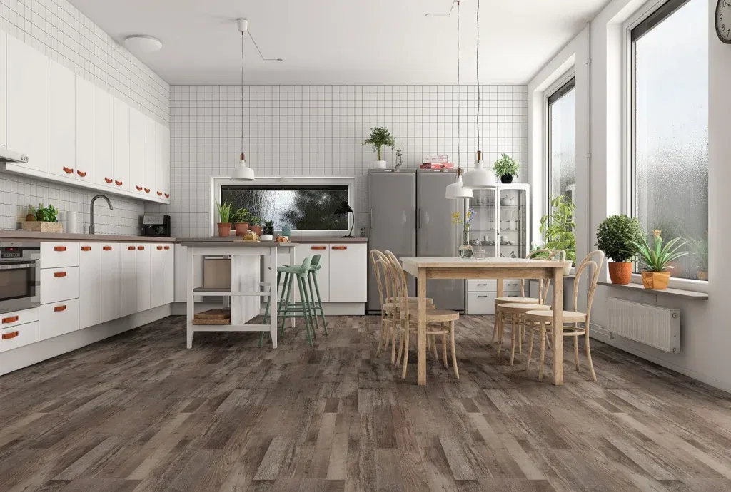 Scandinavian-style kitchen with white cabinetry, vinyl wood plank flooring, and large windows.