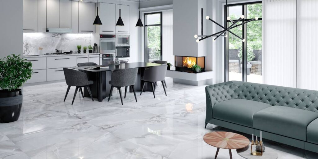 Contemporary open-concept kitchen and living area with large glossy marble floor tiles, minimalist cabinets, island seating, and a modern fireplace